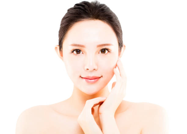 istock closeup young  woman face isolated on white 800995002