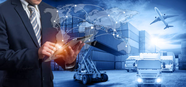 Hand holding tablet is pressing button on touch screen interface in front Logistics Industrial Container Cargo freight ship Hand holding tablet is pressing button on touch screen interface in front Logistics Industrial Container Cargo freight ship for Concept of fast or instant shipping, Online goods orders worldwide plane hand tool photos stock pictures, royalty-free photos & images