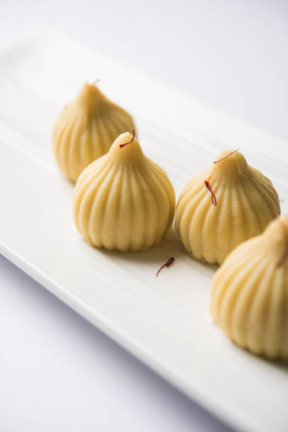 istock A modak is an Indian sweet dumpling popular in India. It is called modak, Kozhakkatta, modhaka, kadubu, modhakam, kozhakkattai, kudumu. made up of coconut and jaggery, rice flour, wheat with khava 801011580