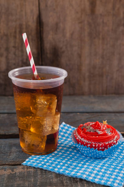 istock Decorated cupcake and cold drink with 4th july theme 801030406