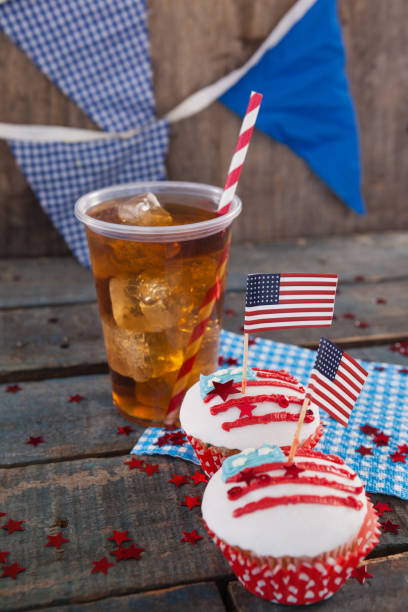 istock Decorated cupcakes and cold drink with 4th july theme 801030452