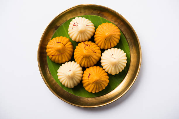 istock A modak is an Indian sweet dumpling popular in India. It is called modak, Kozhakkatta, modhaka, kadubu, modhakam, kozhakkattai, kudumu. made up of coconut and jaggery, rice flour, wheat with khava 801040870
