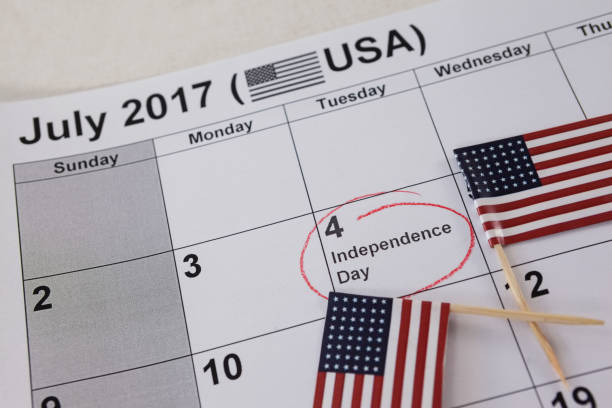 istock Close-up of American flags arranged on calendar 801041174