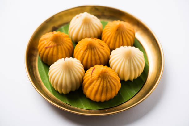 istock A modak is an Indian sweet dumpling popular in India. It is called modak, Kozhakkatta, modhaka, kadubu, modhakam, kozhakkattai, kudumu. made up of coconut and jaggery, rice flour, wheat with khava 801043564