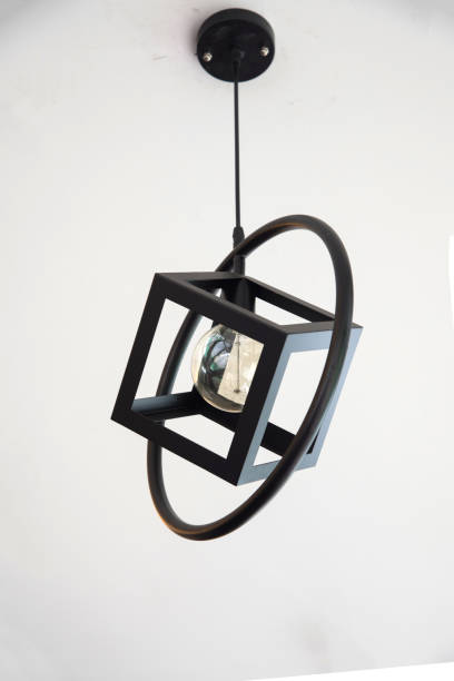 istock Modern chandelier lamp on white background hanging on the ceiling 801046512