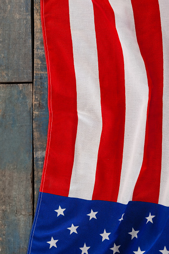 Close-up of an American flag on a wooden table