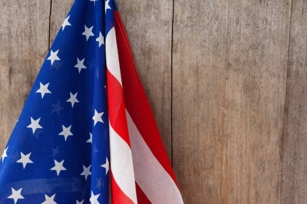 istock American flag on a wooden table 801048854