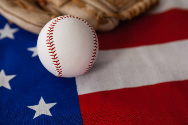 istock Baseball and gloves on an American flag 801049266