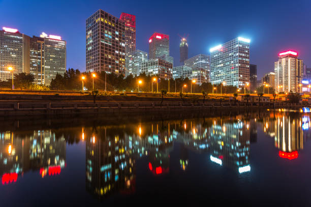River And Modern Buildings Against Sky at night in Tianjin,China.