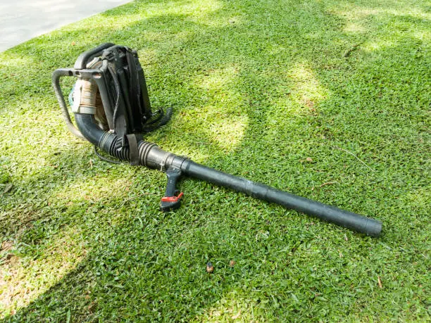 Photo of blower tool placed on grass grounds