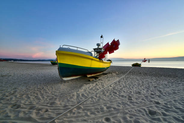 istock Tall Ship under sail with the shore in the background 801054582