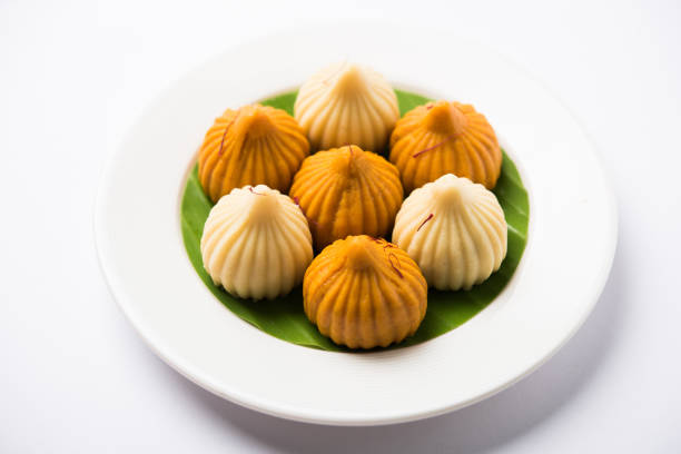 istock A modak is an Indian sweet dumpling popular in India. It is called modak, Kozhakkatta, modhaka, kadubu, modhakam, kozhakkattai, kudumu. made up of coconut and jaggery, rice flour, wheat with khava 801056694
