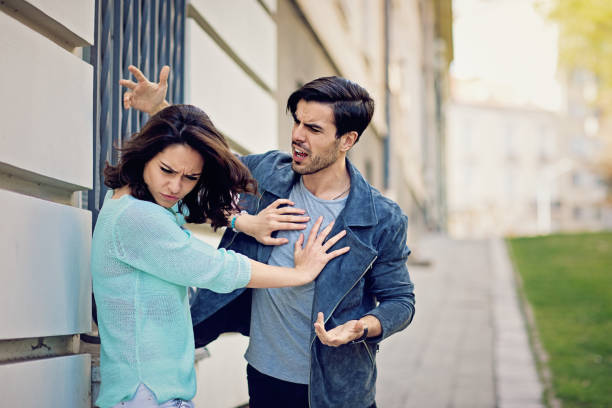 istock Young couple is arguing on the street 801059596