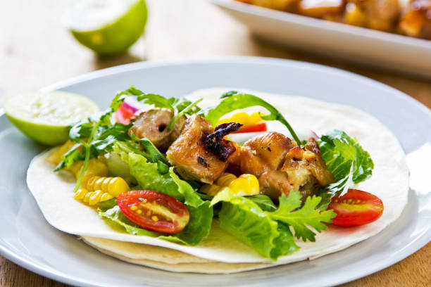 istock Grilled chicken with sweet corn and vegetables Tortilla 801066180