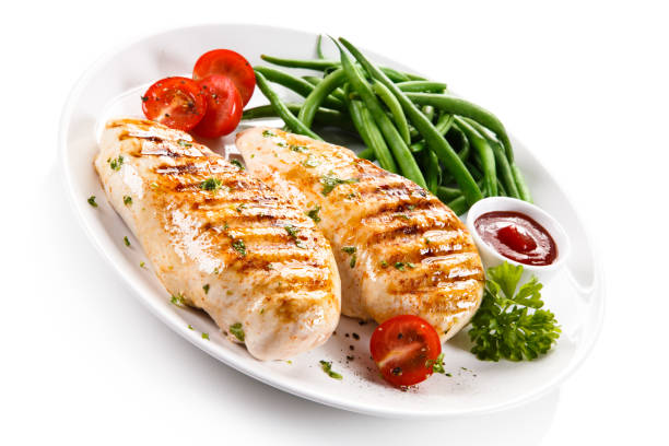 istock Grilled chicken fillet and vegetables 801072084