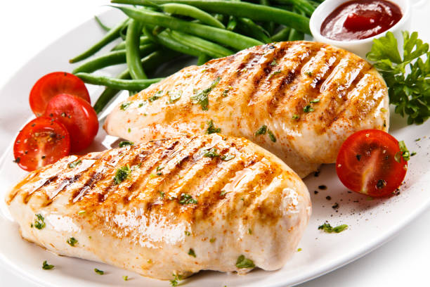 istock Grilled chicken fillet and vegetables 801072136