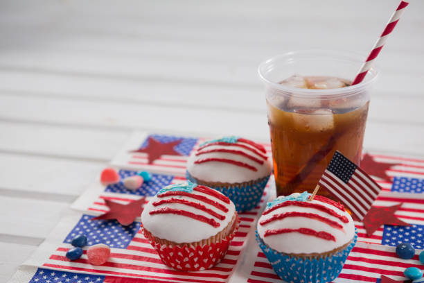 istock Decorated cupcakes and cold drink with 4th july theme 801077468