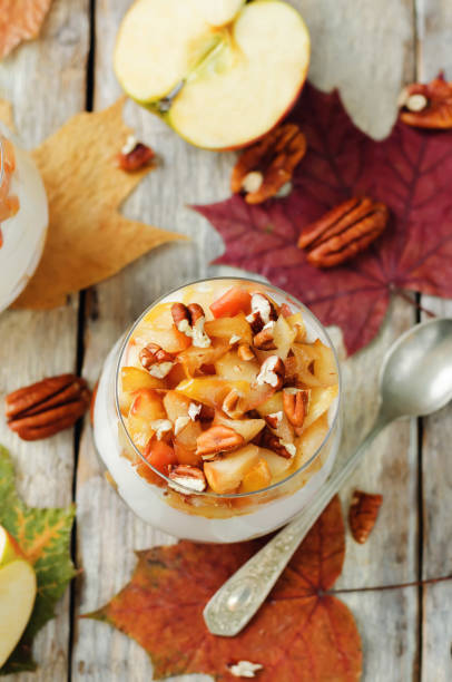 istock Caramelized apples pecan greek yogurt parfait 801077588