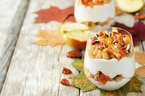 istock Caramelized apples pecan greek yogurt parfait 801077596