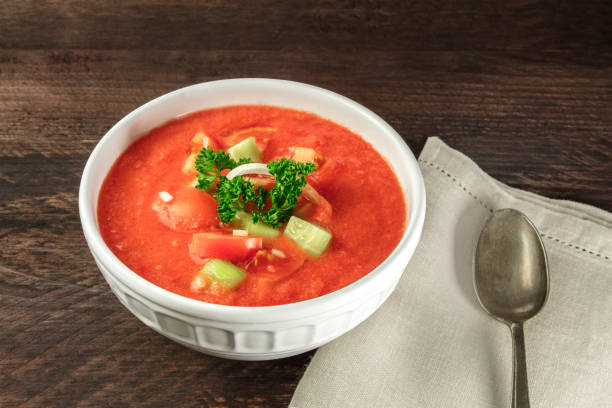 istock Bowl of gazpacho soup on rustic texture with copyspace 801077788