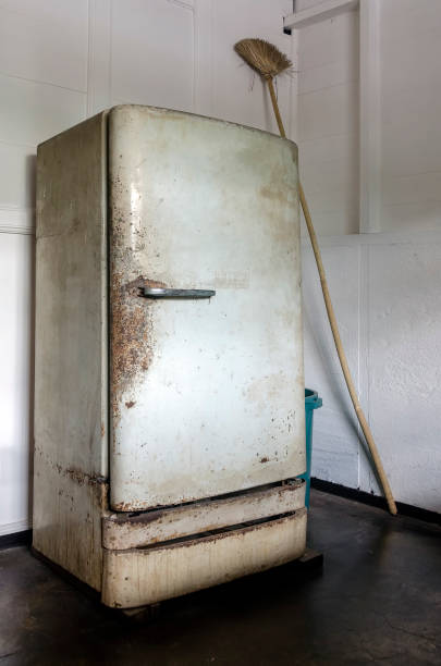 Rusty Vintage Refrigerator stock photo