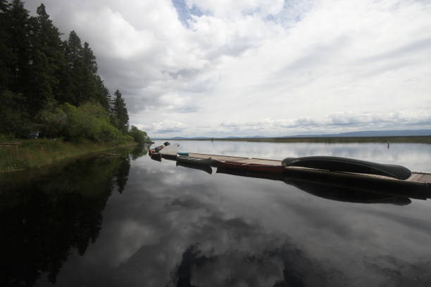istock Boats in a marina on a lake 801080424