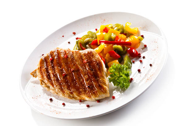 istock Grilled chicken fillet and vegetables 801082684