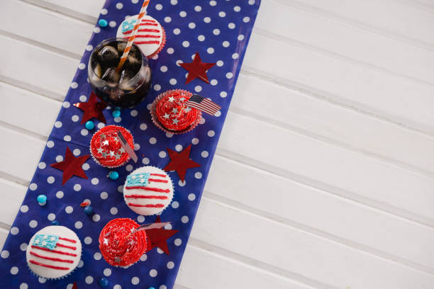 istock Decorated cupcakes and cold drink with 4th july theme 801087520