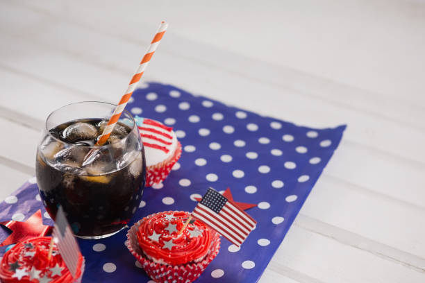 istock Decorated cupcakes and cold drink with 4th july theme 801087526