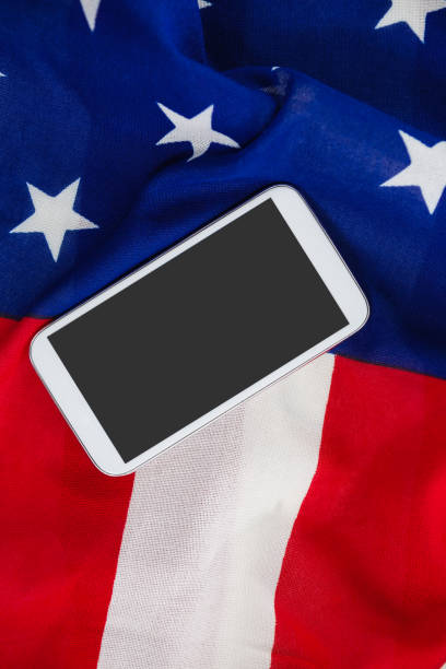 istock Mobile phone on an American flag 801089722