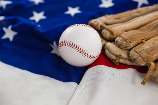 istock Baseball and gloves on an American flag 801089730