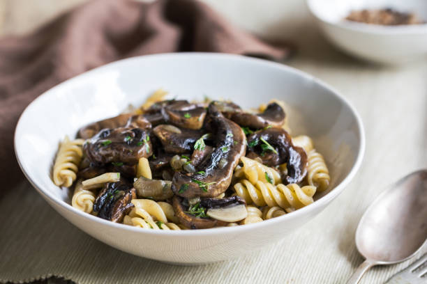 istock Fusilli with mushroom and herb sauce in a bowl 801095512