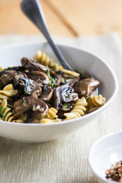 istock Fusilli with mushroom and herb sauce in a bowl 801095530