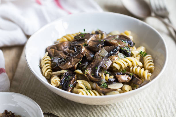 istock Fusilli with mushroom and herb sauce in a bowl 801095532