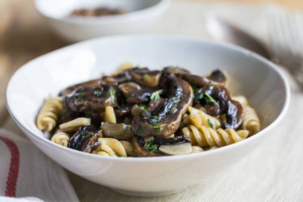 istock Fusilli with mushroom and herb sauce in a bowl 801095538