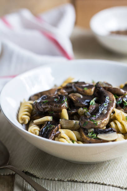istock Fusilli with mushroom and herb sauce in a bowl 801095552