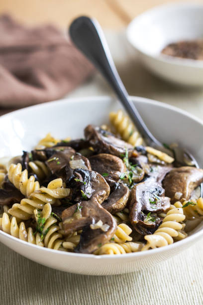 istock Fusilli with mushroom and herb sauce in a bowl 801095584