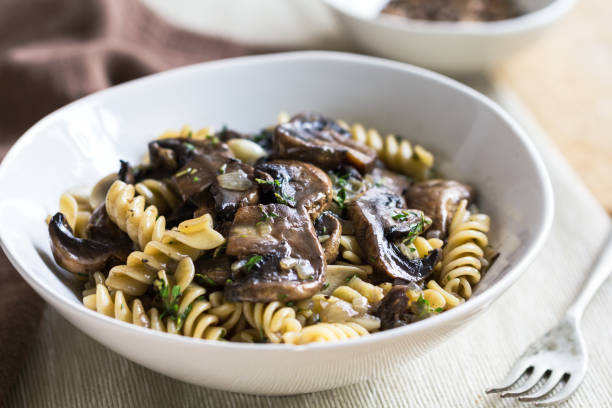 istock Fusilli with mushroom and herb sauce in a bowl 801095628