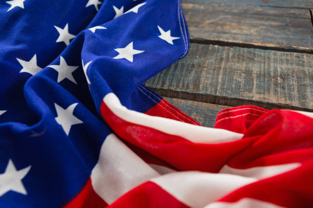 istock American flag on a wooden table 801096034