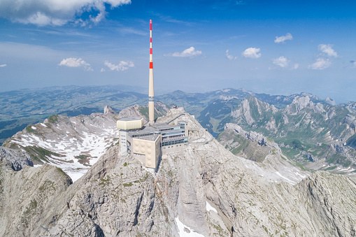 Aerial view of the famous Mountain Säntis in Switzerland. 2501 meters above sea level. Weather Station with view deck and Gondola.