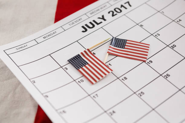 istock Calendar marked with American flags as reminder 801102624