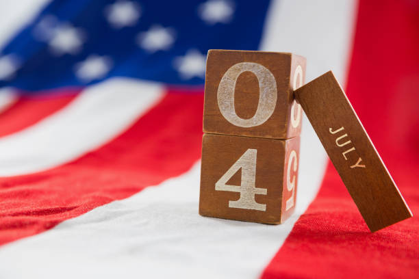 istock Date blocks on American flag with 4th july theme 801102838