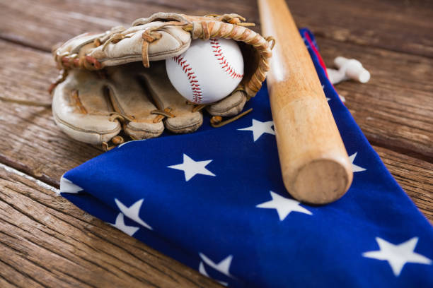istock Baseball bat and gloves on an American flag 801113726