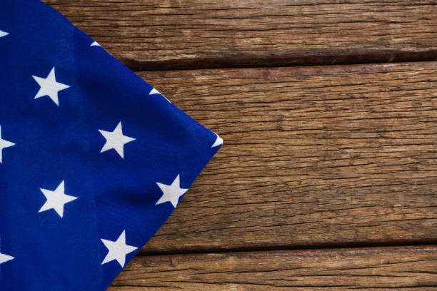 Close-up of American flag on a wooden table