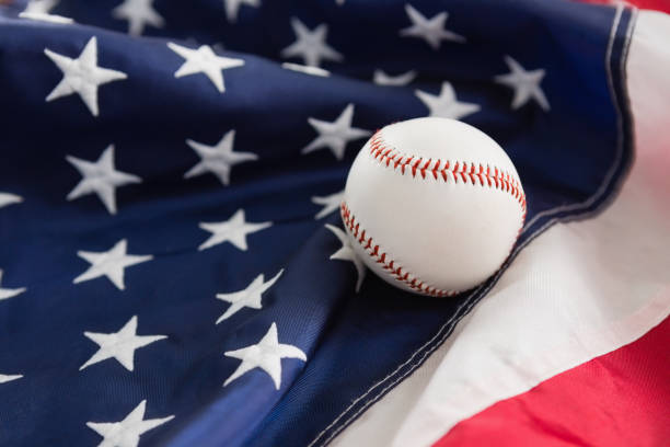 istock Baseball ball on American flag 801113856