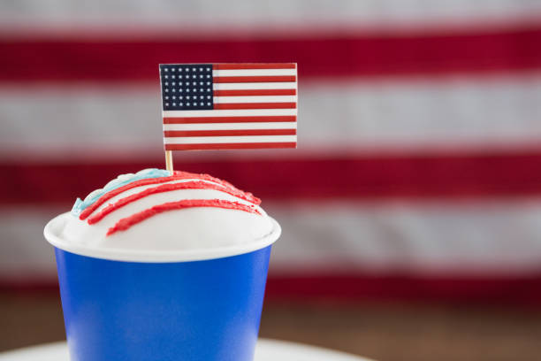 Close-up of patriotic coffee with American flag on wooden table
