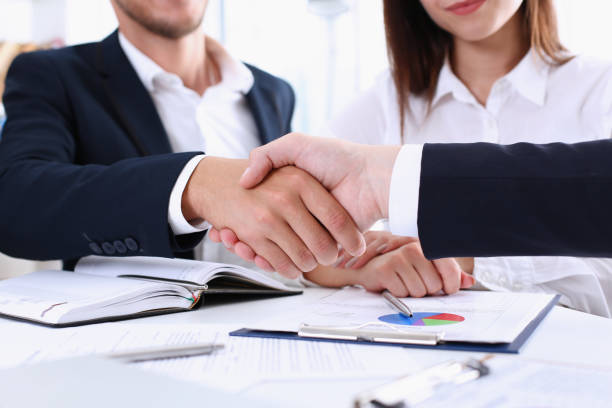 istock Group business peoples shake hands as hello in office closeup 801181834