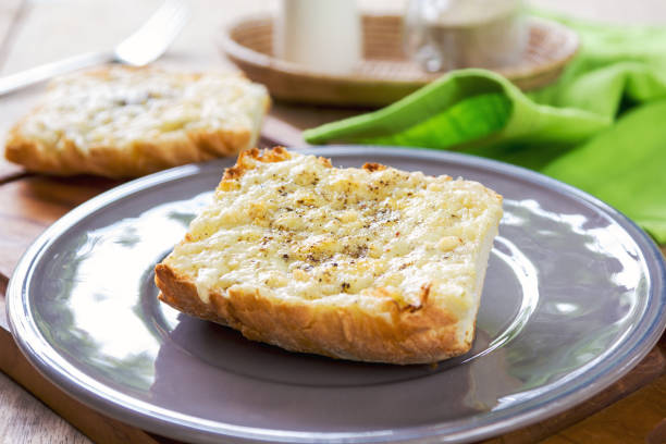 istock Melted Cheddar and Parmesan cheese on baguette 801187538