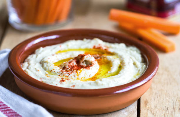 istock Homemade Hummus with carrot sticks 801192580
