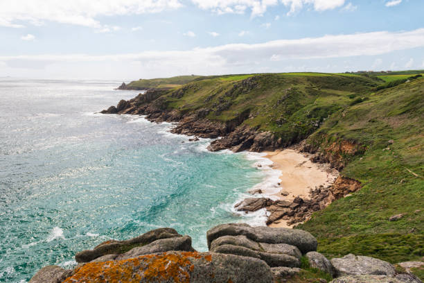 istock Views over Porth Chapel Beach, South Cornwall on a June day. 801224596
